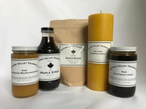 honey, maple syrup, maple sugar, beeswax candle, raw honey